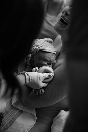 mother cries with joy after giving birth at Cedars Sinai Los Angeles