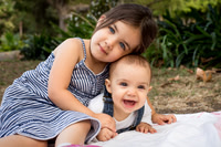 Sisters laughing in a park