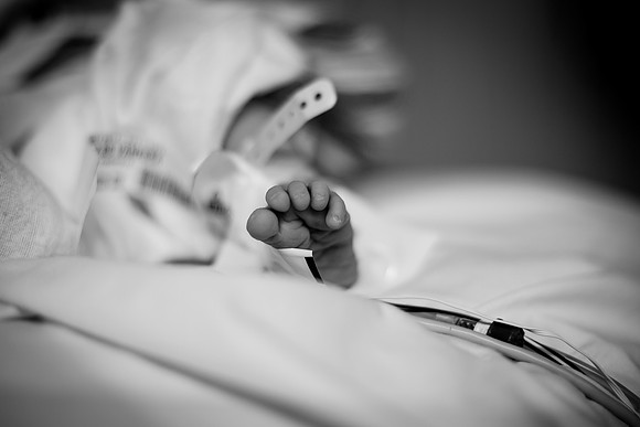 Newborn baby boy foot