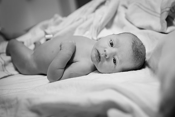 newborn baby girl in hospital after birth